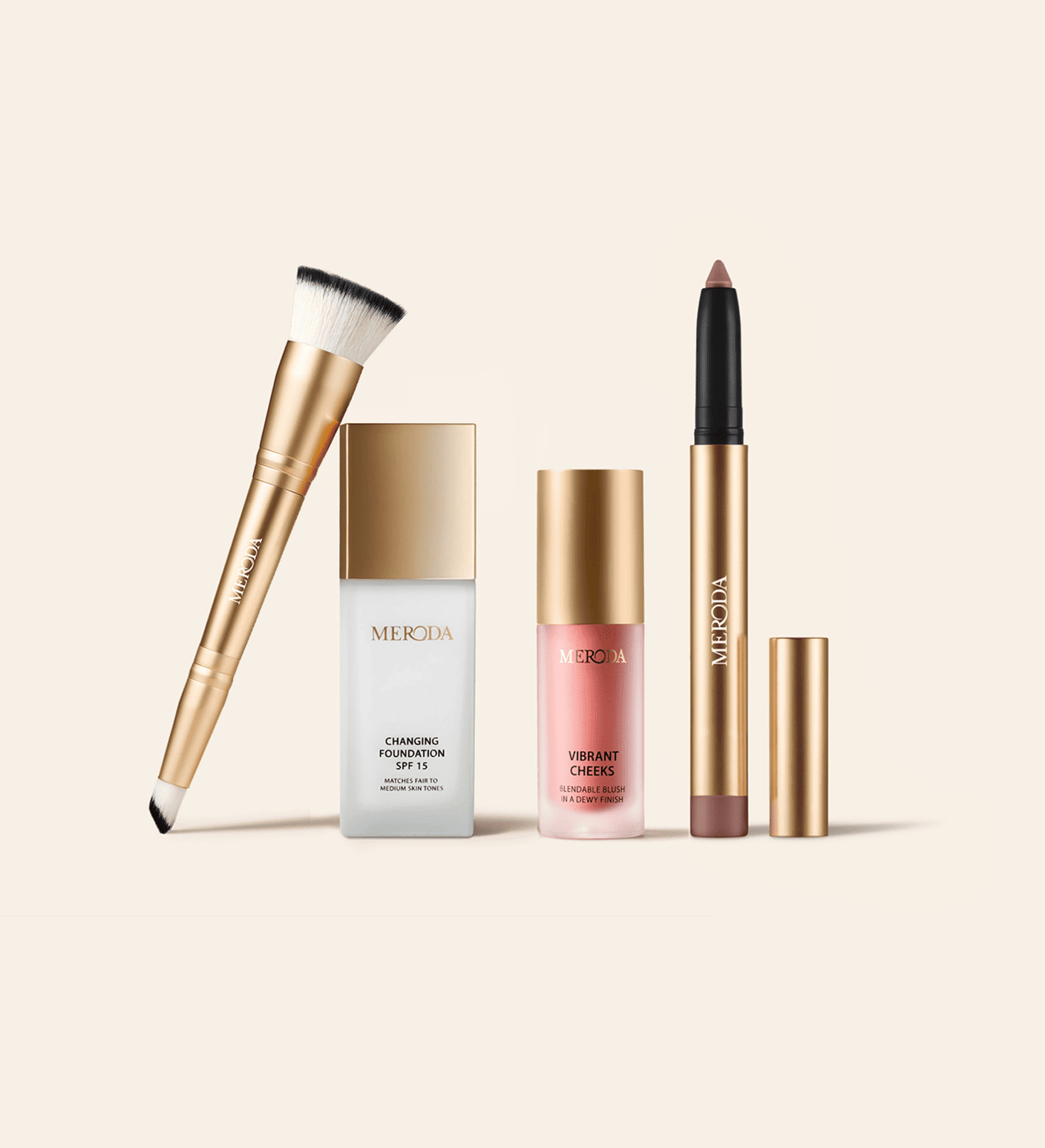 Meroda Cosmetics The Daily Routine Set: Changing Foundation, 2-in-1 brush, liquid blush and shimmer stick on light backdrop.