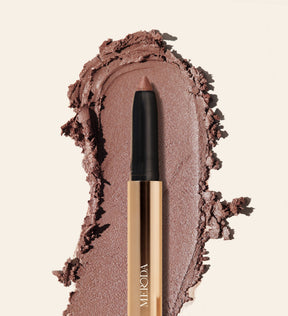Meroda Eye Perfecting Shimmer Stick in Mauve with a creamy texture swatch and light-reflecting finish