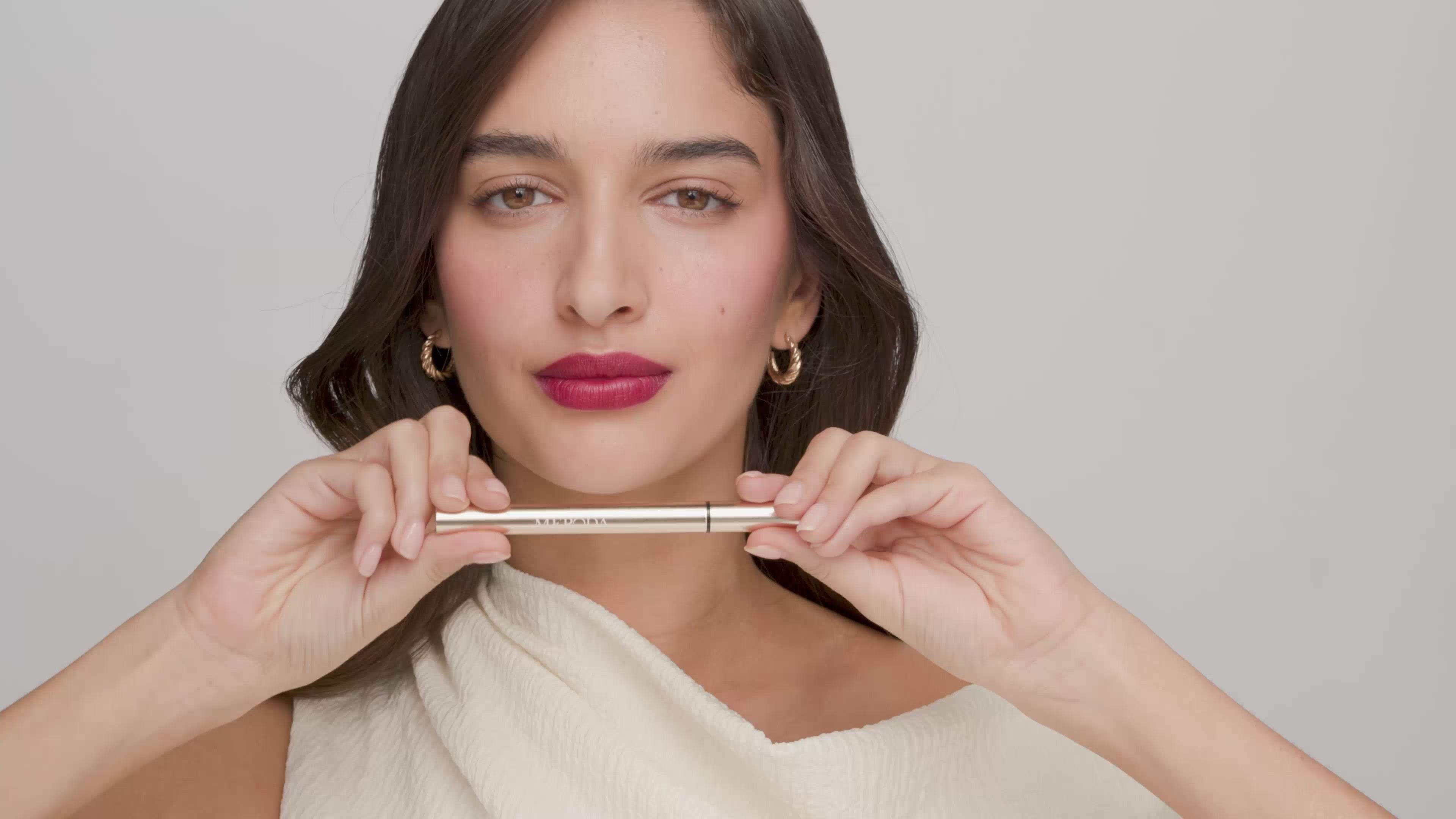 Precise black wing created with It's All About The Wing Liquid Waterproof Eyeliner in a sleek gold pen.