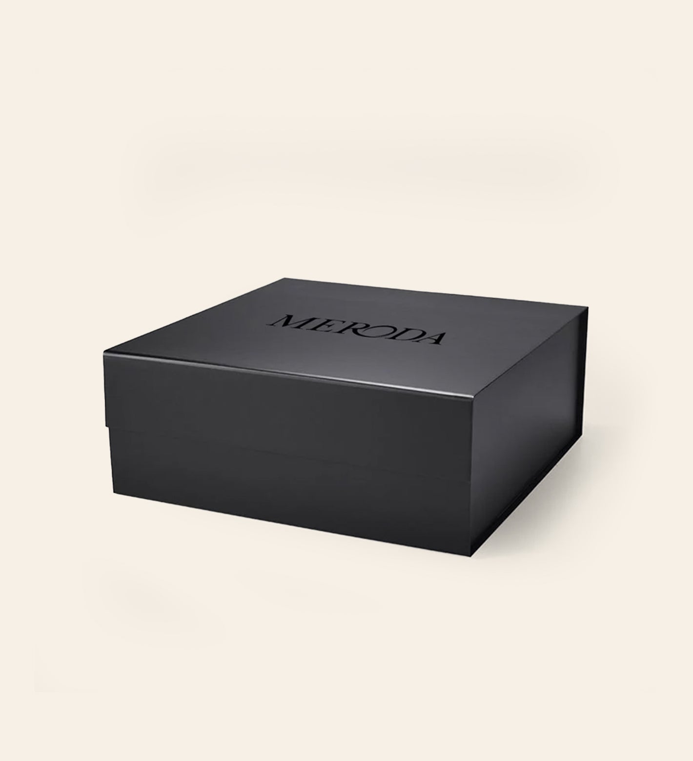 Meroda Cosmetics matte black Gift Box featuring a sleek magnetic closure on a light background