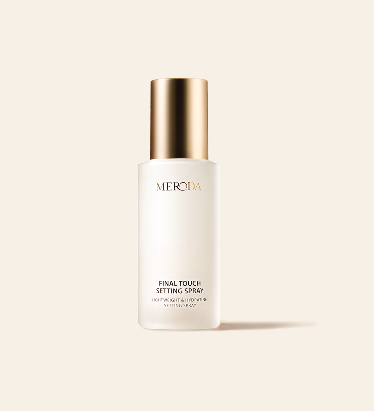 Meroda Cosmetics Final Touch Setting Spray in a frosted bottle with a gold cap for a lightweight, hydrating finish.