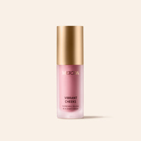 Meroda Cosmetics Vibrant Cheeks Liquid Blush bottle in Grape Galore featuring a gold cap and dewy finish.