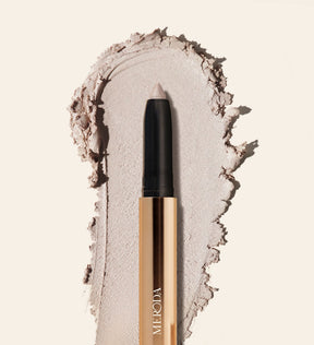 Meroda Eye Perfecting Shimmer Stick in Pearl with a creamy, radiant texture swatch to brighten your eye color.