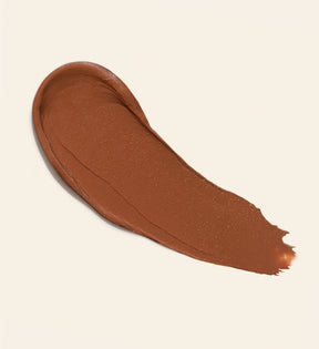 Soft Tan Bronzer creamy texture swatch in shade Dark, demonstrating the smooth, buildable finish.