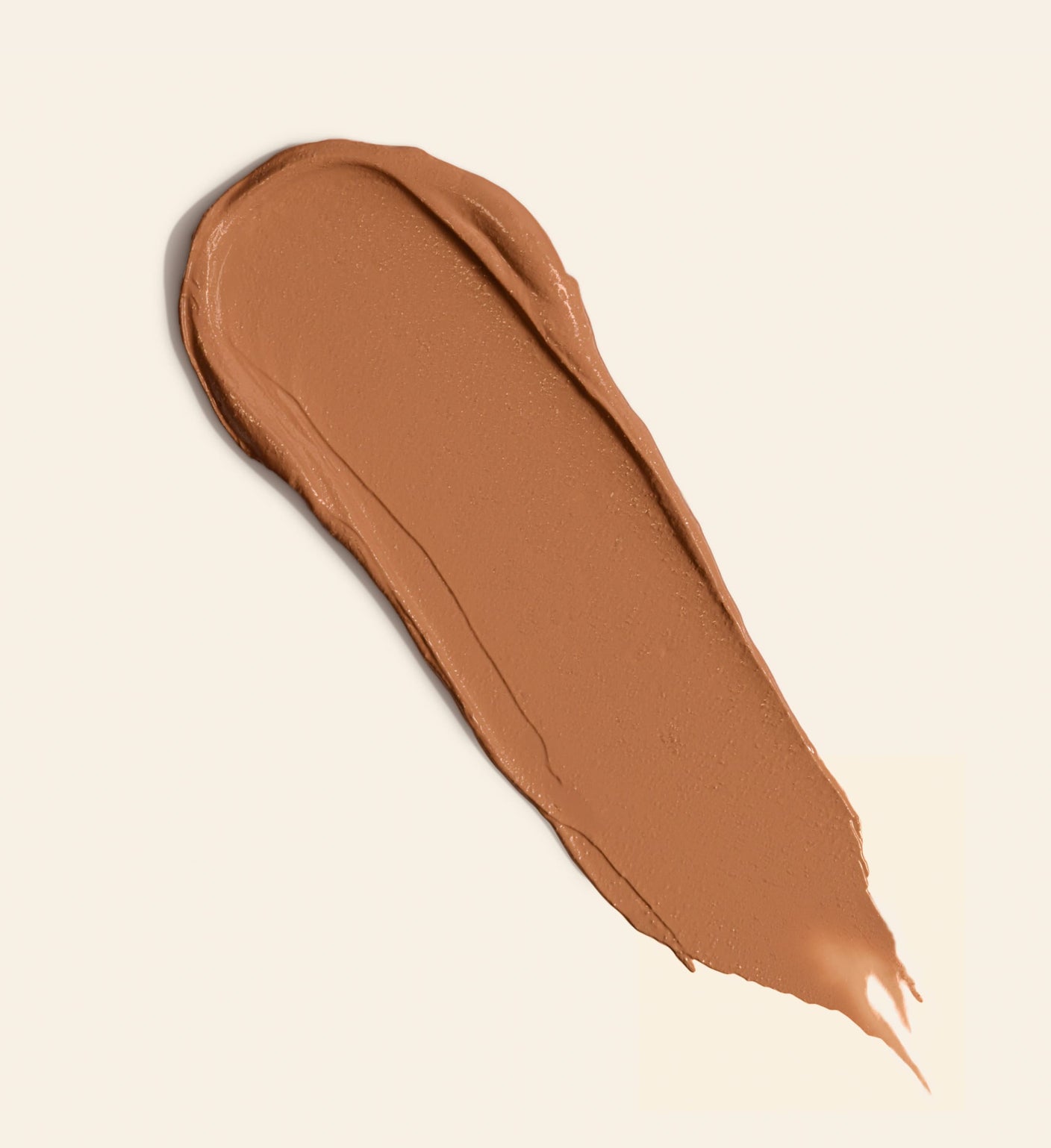 Meroda Cosmetics Soft Tan Bronzer swatch in Medium, showcasing the creamy, blendable formula for a natural glow.
